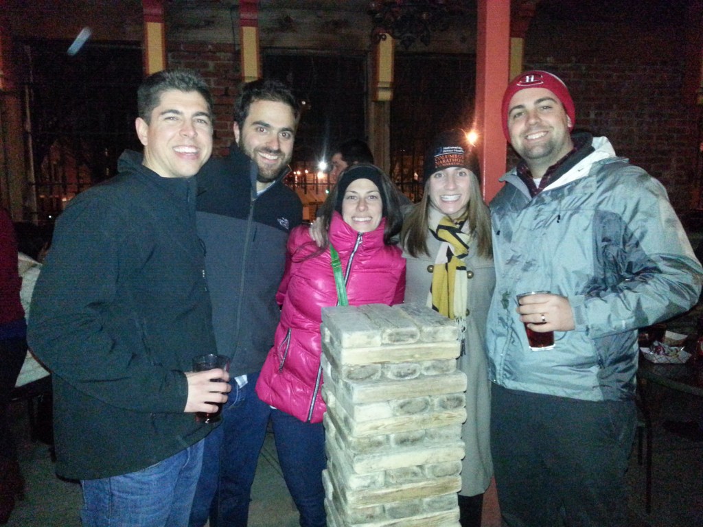 group in front of Giant Jenga 
