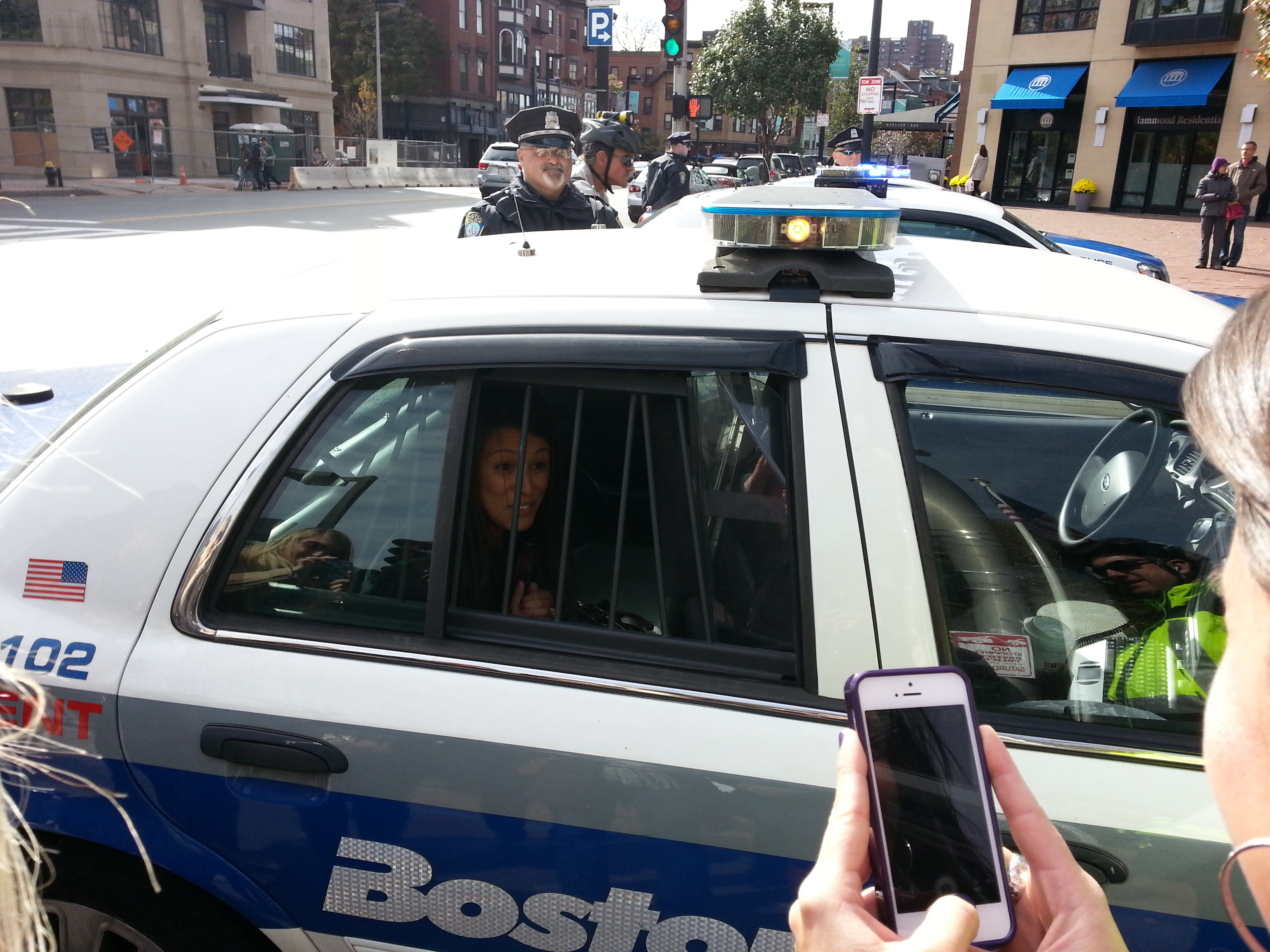 Busted! Melgar in a cop car. 