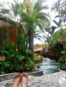 sitting outside one of the hot pools