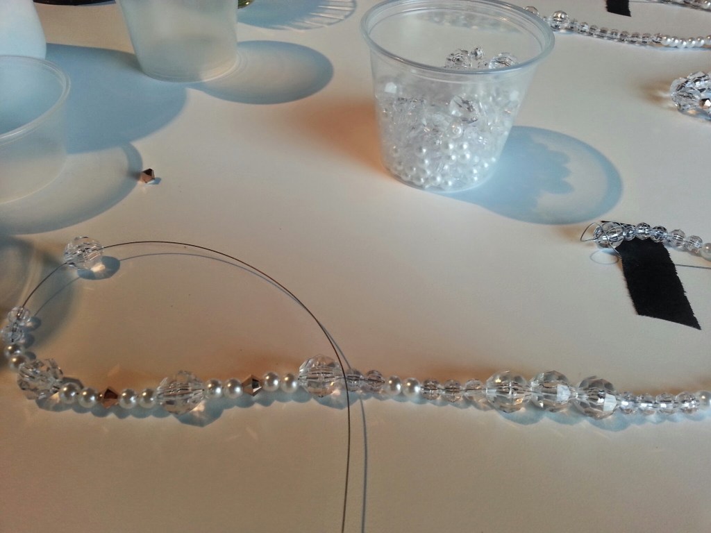 every colored bead on the strands represent a new person who helped out.