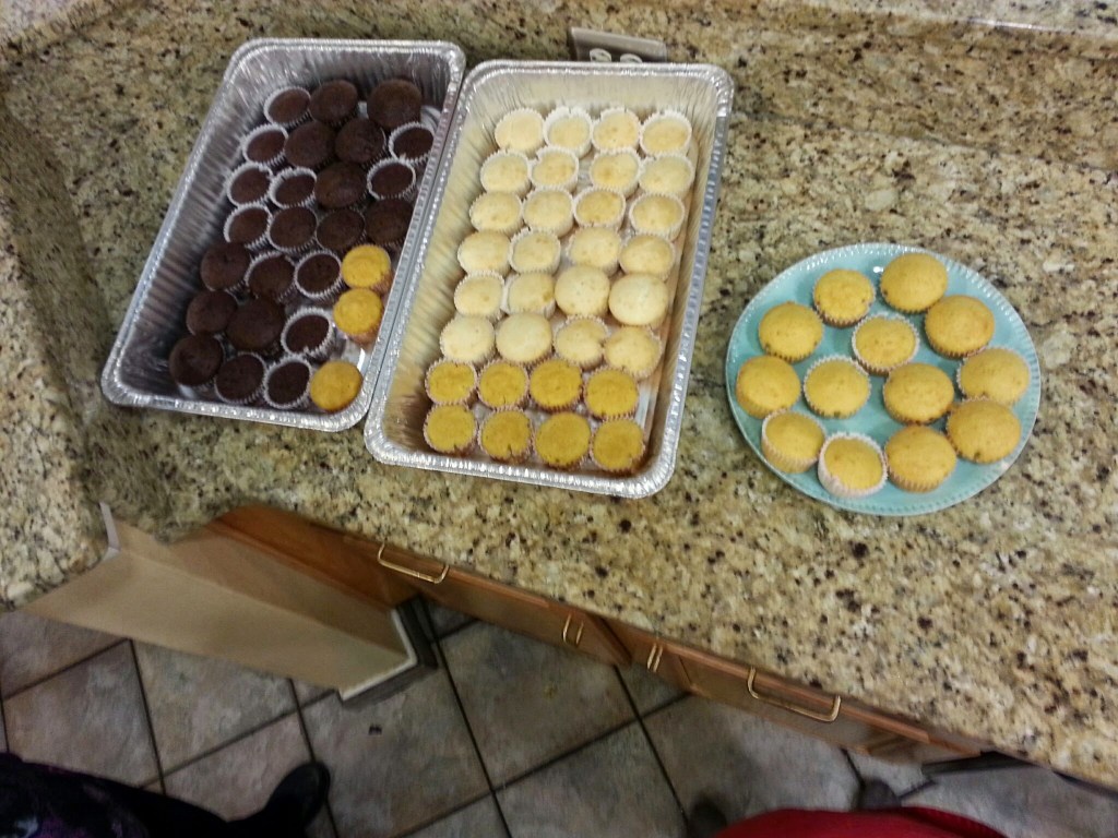 This is what cupcakes for 50 families looks like. We had a blast decorating them with the kids!