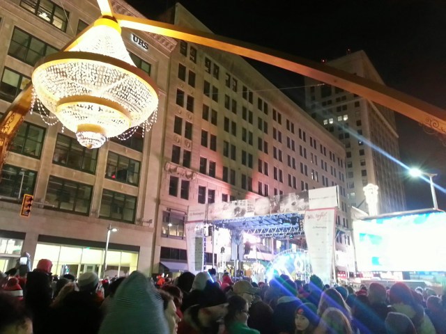 Love the Christmas music, the tree and chandelier lighting and all the people!