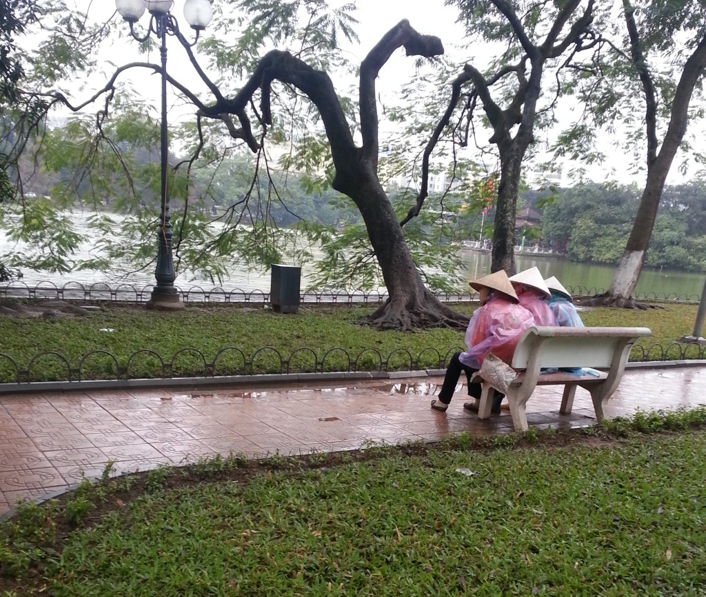 ladies sitting around the lake