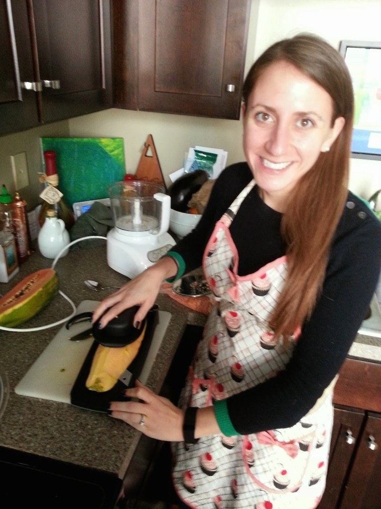 Using a mandolin for the papaya (last time Ali used one she almost lost her thumb ...)