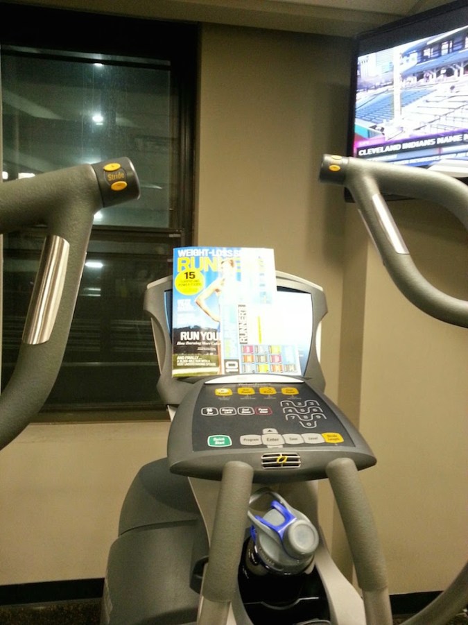 My elliptical set up. Phone, check. Water, check. Magazine, check. TV, check.