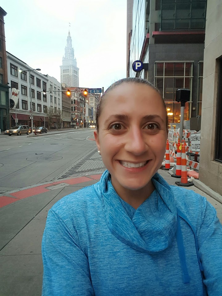 I took a selfie while waiting for Erica-  you can see the Terminal Tower in the background AND the fact that my shirt is indeed too warm for our run.