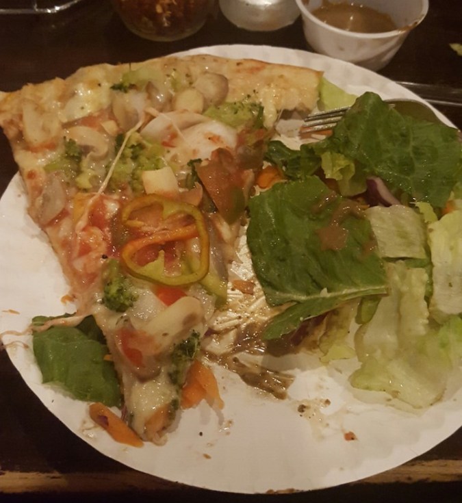veggie slice and salad.