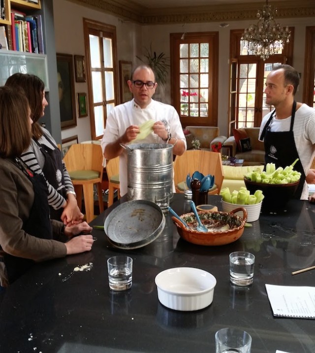 learning how to roll our tamales