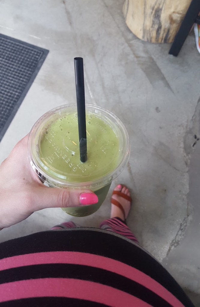 a common pregnancy occurrence - big belly and colorful smoothie!